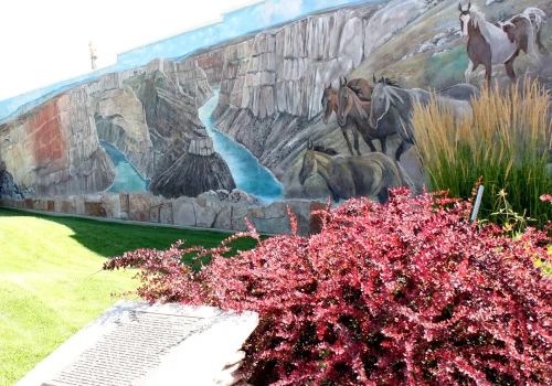 Mural park in Lovell portraying Big Horn Canyon and wild mustangs